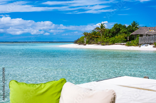 View from Over water terrace to beach and palms