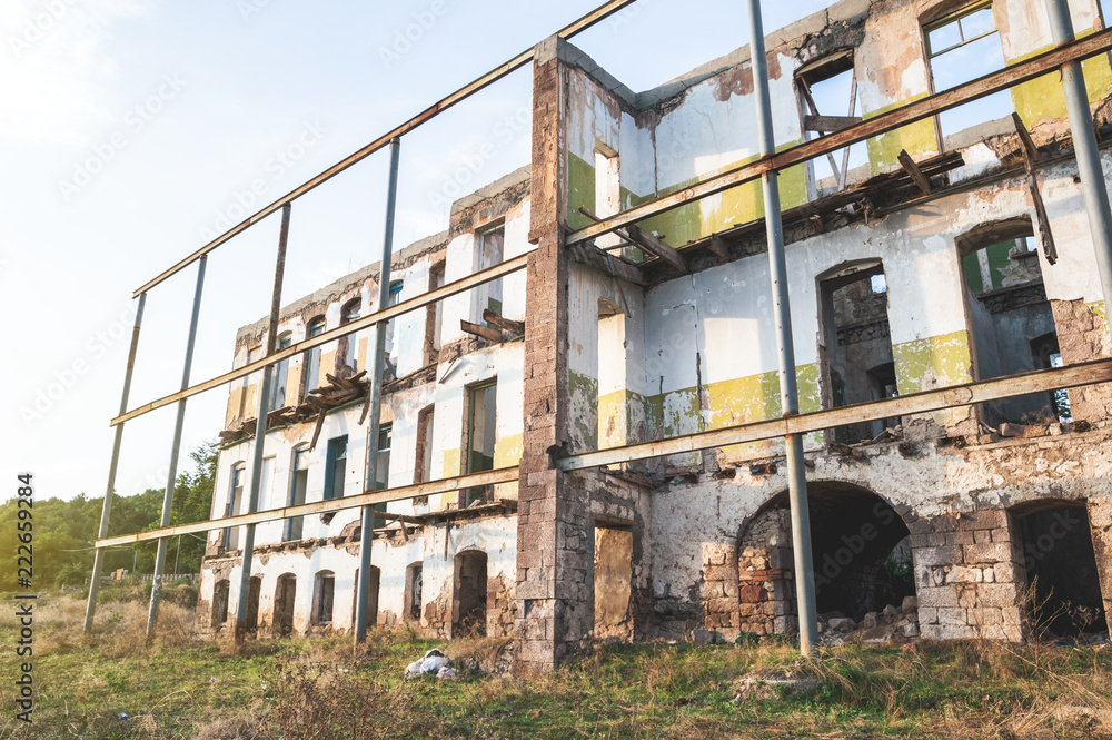 Walls and facade of an old ruined abandoned building Walls and facade of an old ruined abandoned building