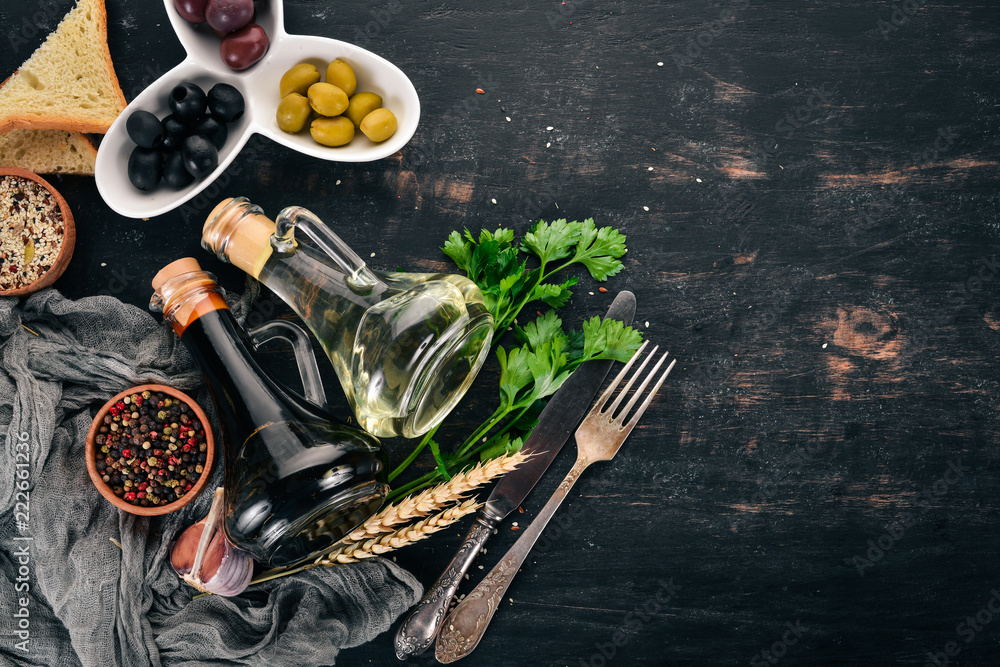 The background of cooking. Vegetables and spices. On a wooden background. Free space for text. Top view. The background of cooking. Vegetables and spices. On a wooden background. Free space for text. Top view.