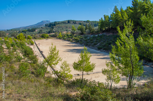 Stadium of the Panhellenic Games at archaeological site of Nemea in Greece. Nemea was a religious sanctuary in the northern Peloponnese where Panhellenic athletic games were held photo