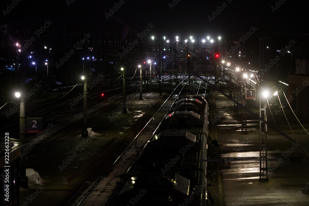 Railway road traffic in the city at night Railway road traffic in the city at night