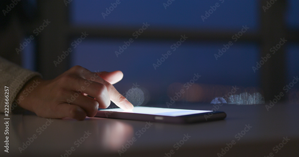 Woman use of mobile phone at night Woman use of mobile phone at night