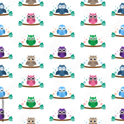 Owls on the brunches seamless pattern