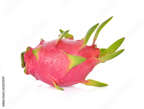 dragon fruit with drops of water on white background.