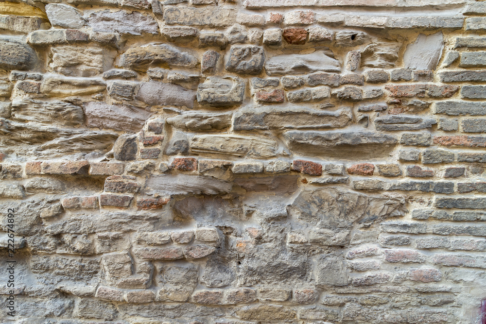 brick wall in old stone brick wall in old stone