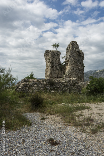 Ruin of old lighthouse on the coastline. Ruin "Večka kula" in the Croatia.