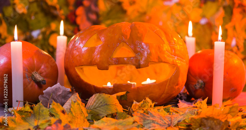 Jack-o-Lantern halloween pumpkin with mist pouring from it's mouth photo