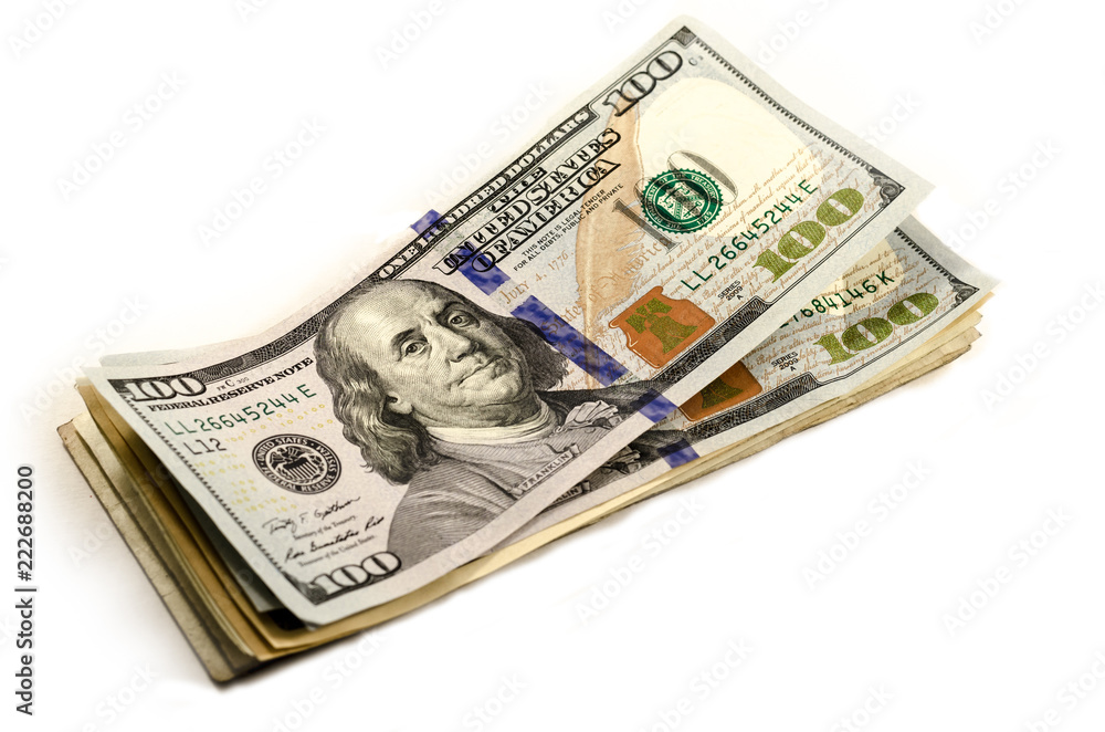 dollars, dollars, dollars!, a pile of dollar bills over with some cent coins over a white background. symbol of wealth dollars, dollars, dollars!, a pile of dollar bills over with some cent coins over a white background. symbol of wealth