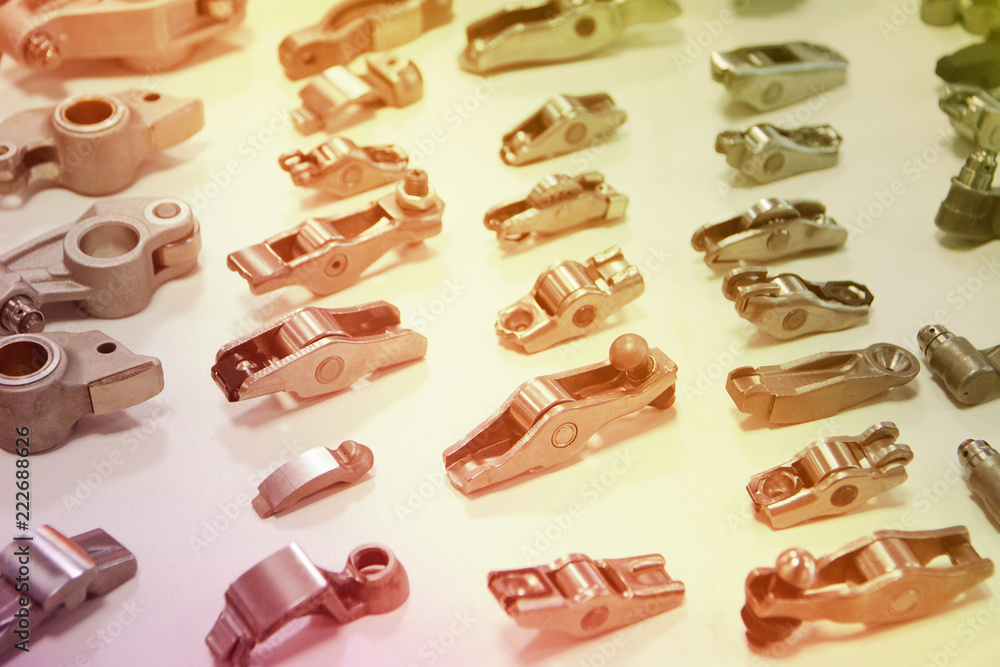 Hob in the aluminum cage. Part of automotive suspension, chassis clean and lever. car parts Hob in the aluminum cage. Part of automotive suspension, chassis clean and lever. car parts
