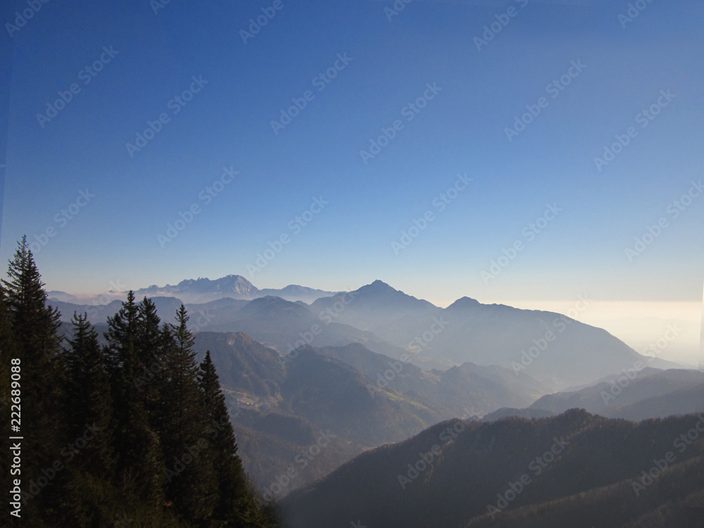 Panoramic view of the Slovenian alps  landscape with fog in the valley