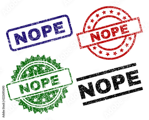 NOPE seal prints with corroded style. Black, green,red,blue vector rubber prints of NOPE text with corroded texture. Rubber seals with circle, rectangle, rosette shapes.