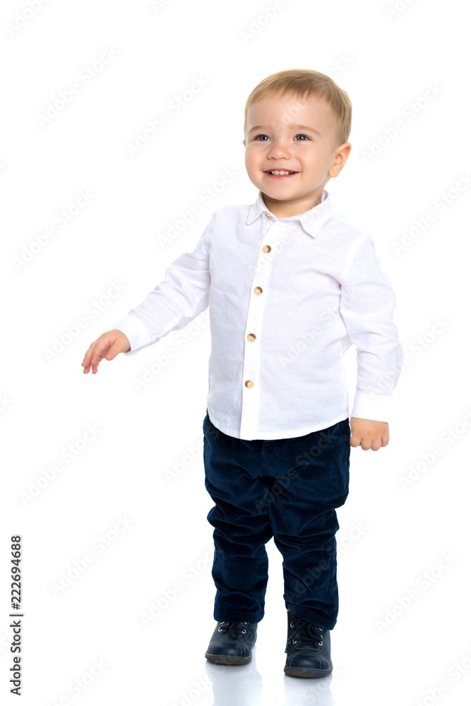The little boy is emotionally waving his arms. The little boy is emotionally waving his arms.