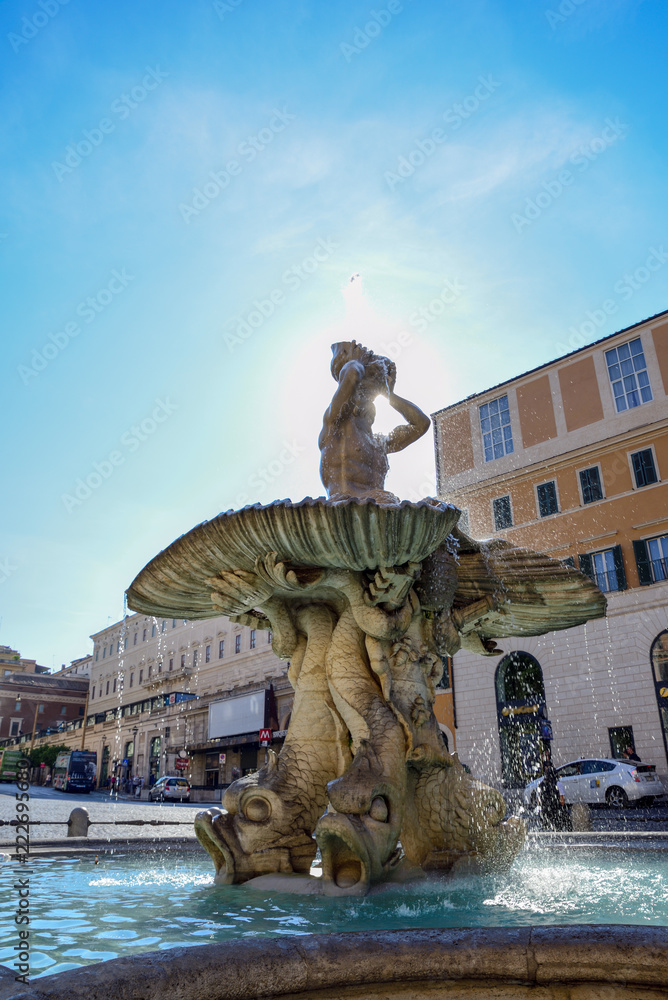 Triton fountain in Barberini square, Rome Italy.