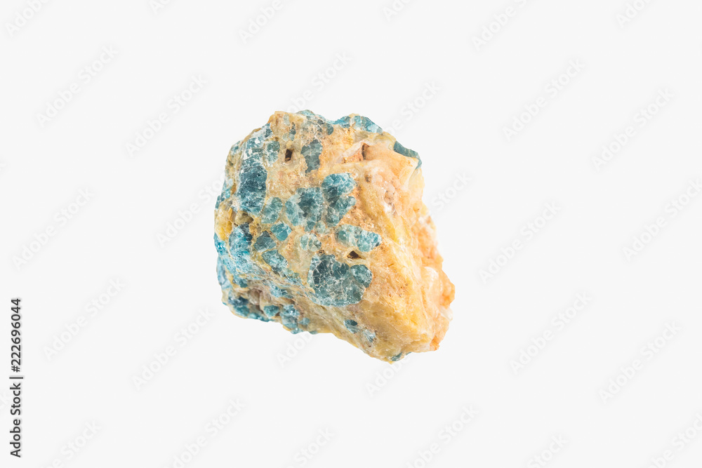 Bright apatite stone crystal isolated. Macro shooting. Bright apatite stone crystal isolated. Macro shooting.
