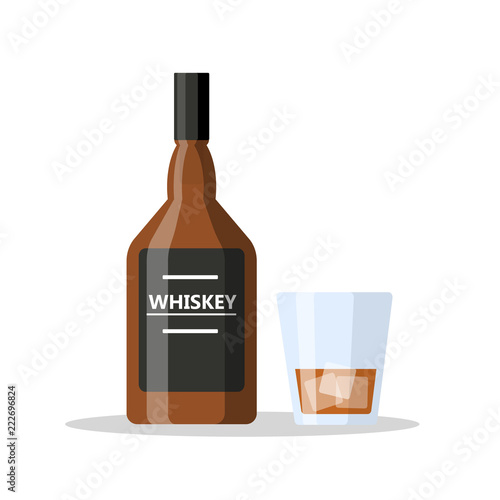Whiskey bottle and glass with alcohol and ice cube