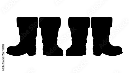 Santa Claus or Saint Nicholas boots - black silhouette of two pairs