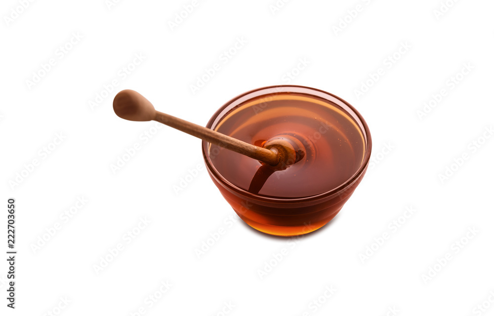 Honey in jar isolated on a white background Honey in jar isolated on a white background