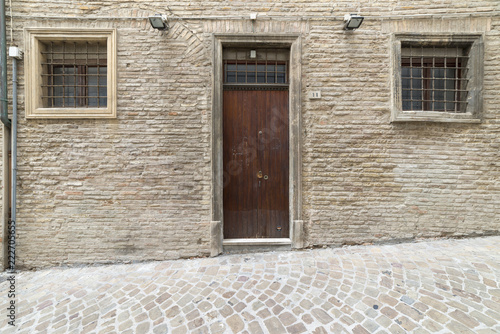 antique entrance door, wood and metal and window