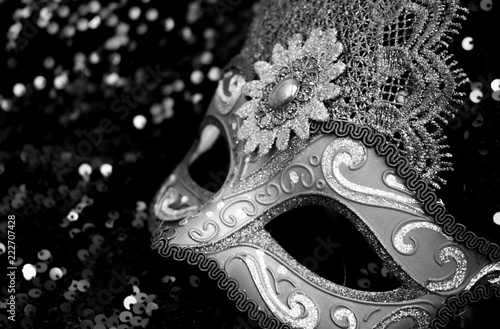 Carnival mask in black and white background with copy space 