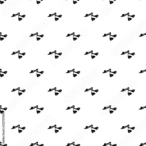 Seamless pattern with hand drawn curling irons for eyelashes 