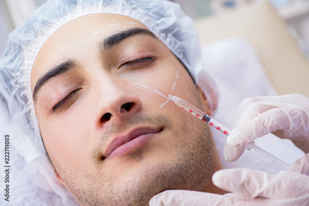 Man visiting doctor for plastic surgery 