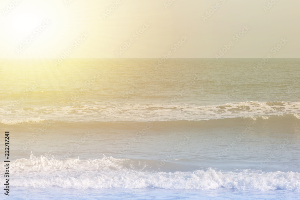 View of sea with sunshine in the morning, Sea waves blowing in the wind. Summer and holiday concept.