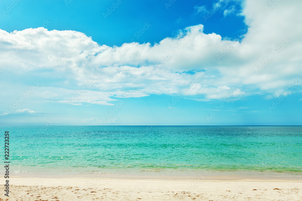 Beautiful Tropical beach andaman sea and clear blue sky background,in phuket island,Summer beach with wave crashing on sandy shore landscape travel and tour concept. Beautiful Tropical beach andaman sea and clear blue sky background,in phuket island,Summer beach with wave crashing on sandy shore landscape travel and tour concept.