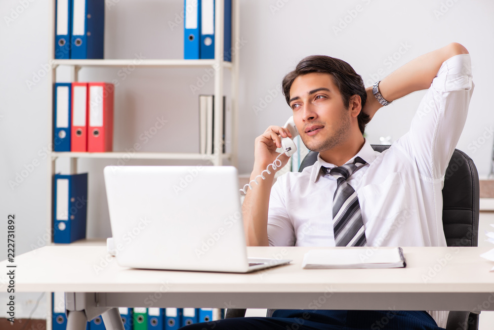 Young call center operator speaking on phone Young call center operator speaking on phone