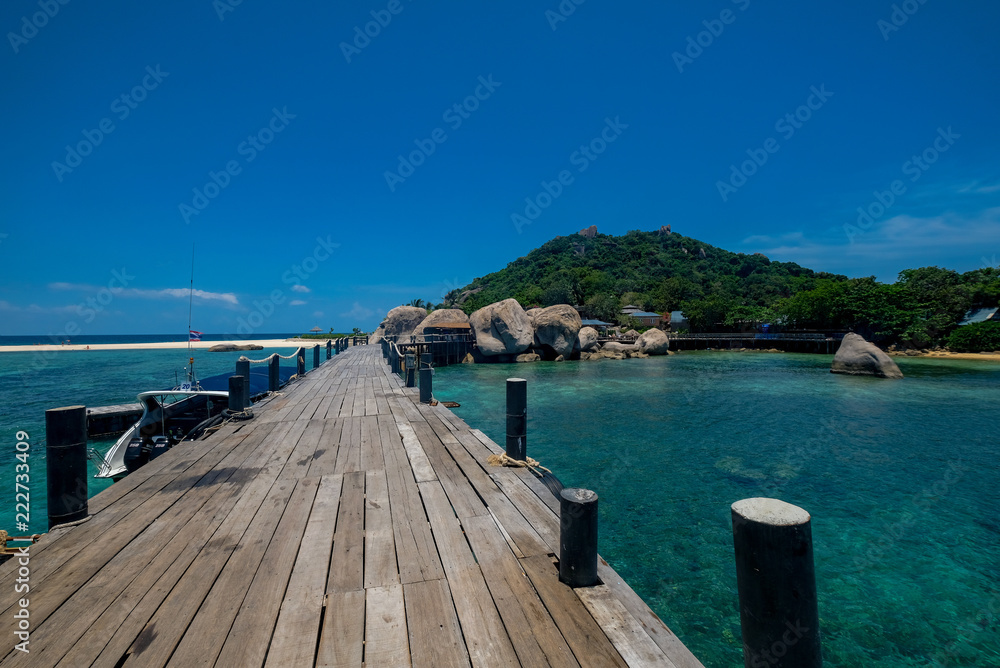 Wooden bridge in Nanyuan Island on a beautiful day, Thailand