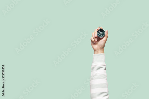 Woman holding compass