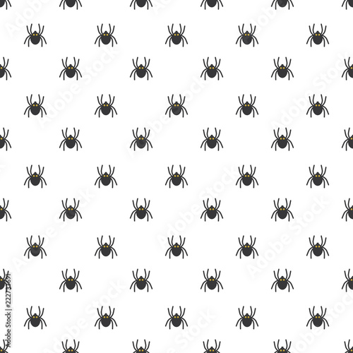 Black cute spiders pattern with golden eyes on white background © pelikanz