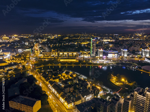 Aerial panoramic view of city center at night with bright street  illumination. Minsk  Belarus