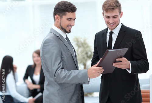 Manager conveys to the employee the documents in the office © ASDF