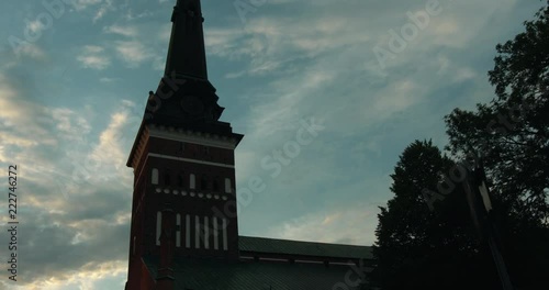 Timelapse shot of Västerås Cathedral with vivid clouds moving