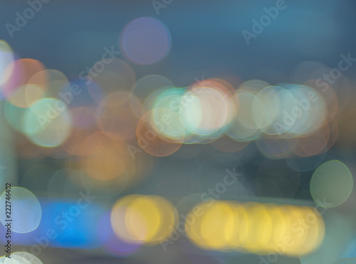 abstract blurred of colorful lights background:blur of Christmas wallpaper decorations concept.l backdrop:sparkle circle lit celebrations display.