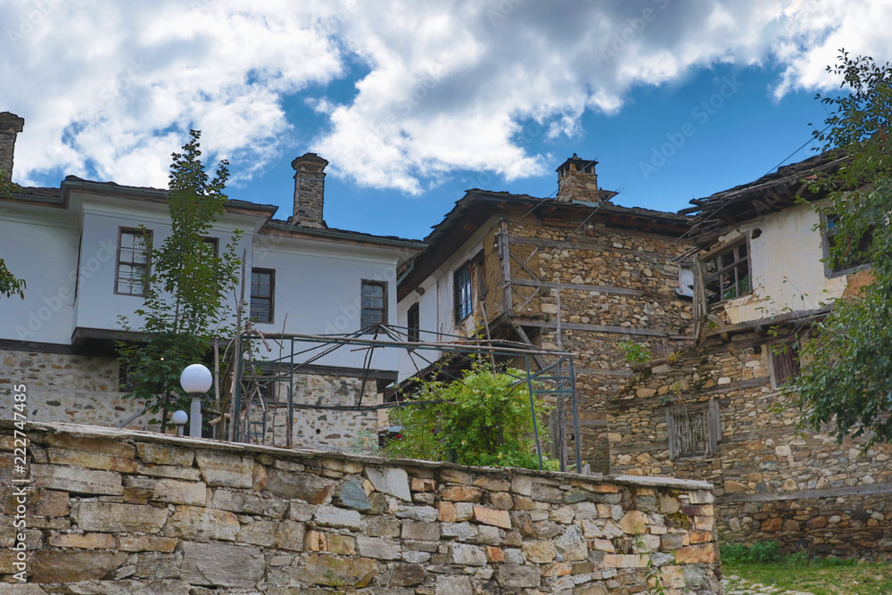 Old houses in the historical cultural reserve village of Dolen, Bulgaria. Dolen is famous with its 350 old houses – an example of 19th century Rhodopean architecture.
