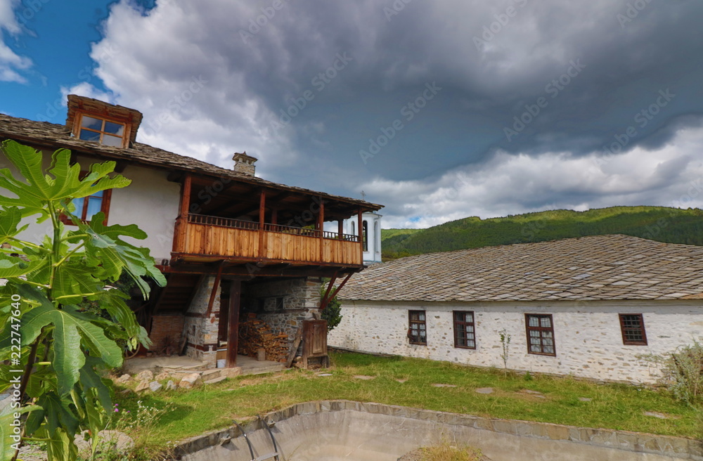 Old houses in the historical cultural reserve village of Dolen, Bulgaria. Dolen is famous with its 350 old houses – an example of 19th century Rhodopean architecture. Old houses in the historical cultural reserve village of Dolen, Bulgaria. Dolen is famous with its 350 old houses – an example of 19th century Rhodopean architecture.