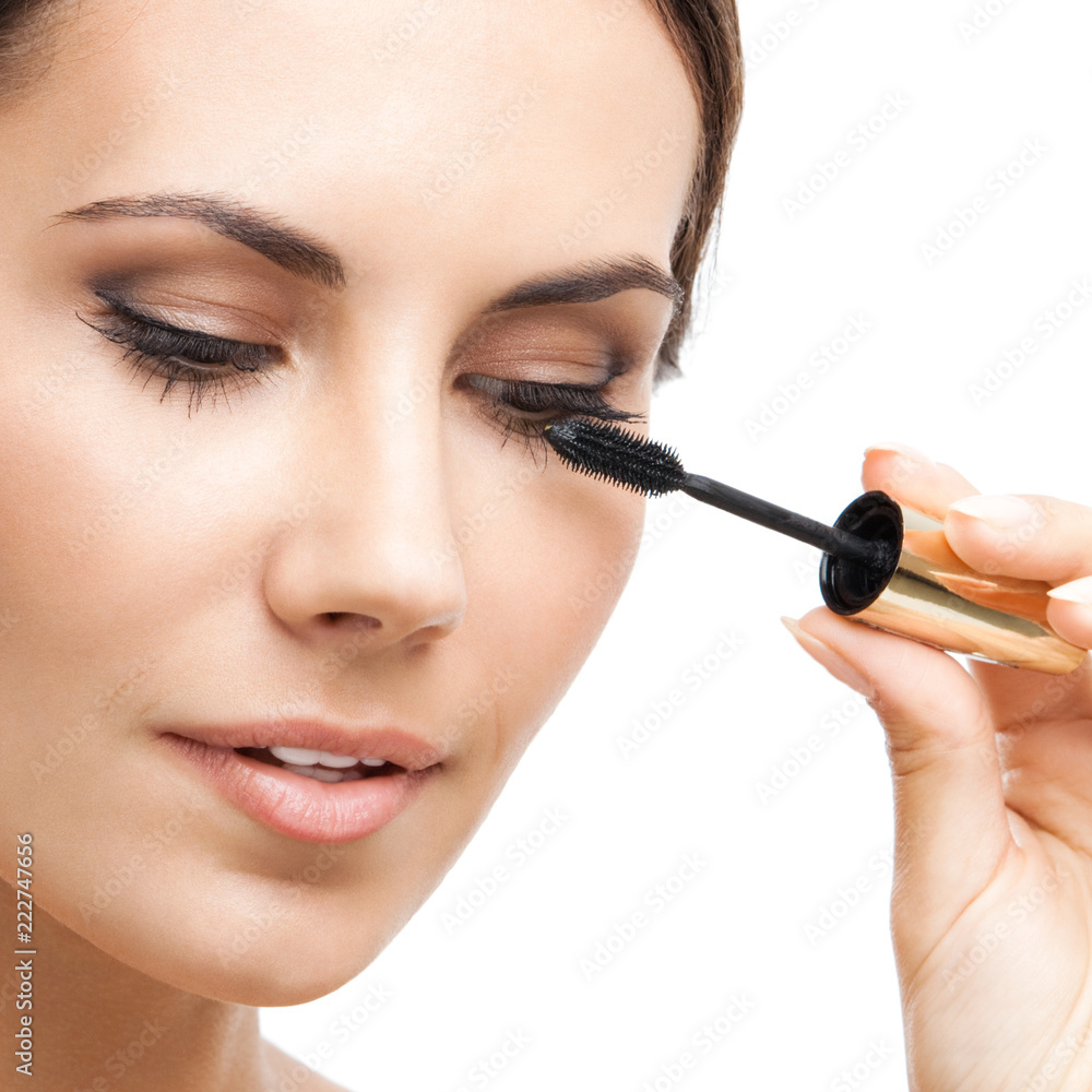 Young woman with cosmetics brush, isolated Young woman with cosmetics brush, isolated