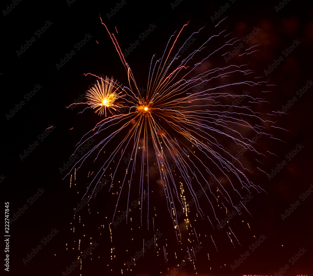 Fireworks in the night sky as a background