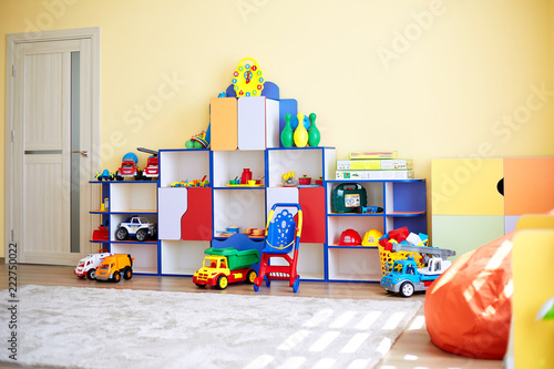 Cozy children's room with yellow-orange walls