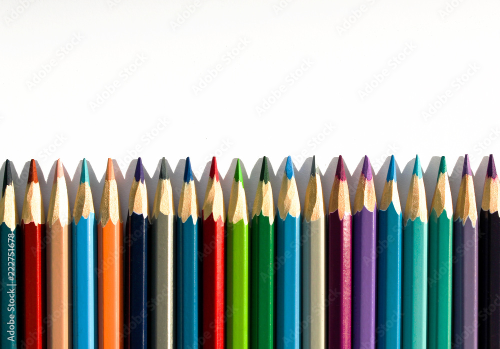 Colored Pencils on White Background in a Row Colored Pencils on White Background in a Row