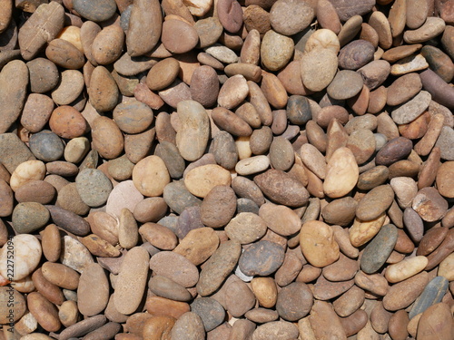 background of smooth stones in garden