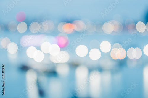 Fotografi Blurred abstract background of office building at sea harbour at evening time,urban life