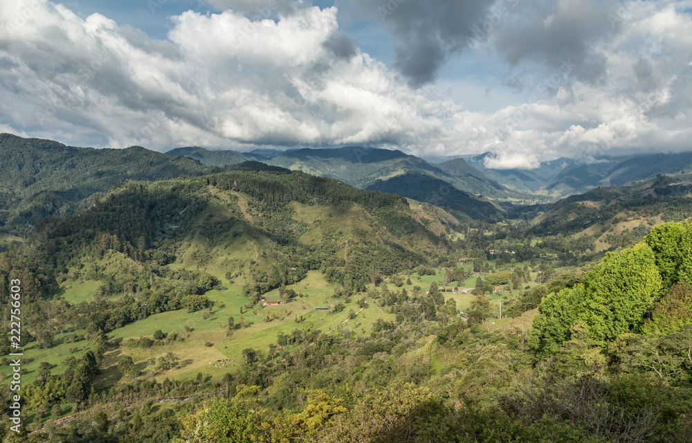 The Cocora valley and the Nevados mountain range seen from Salento viewpoint The Cocora valley and the Nevados mountain range seen from Salento viewpoint