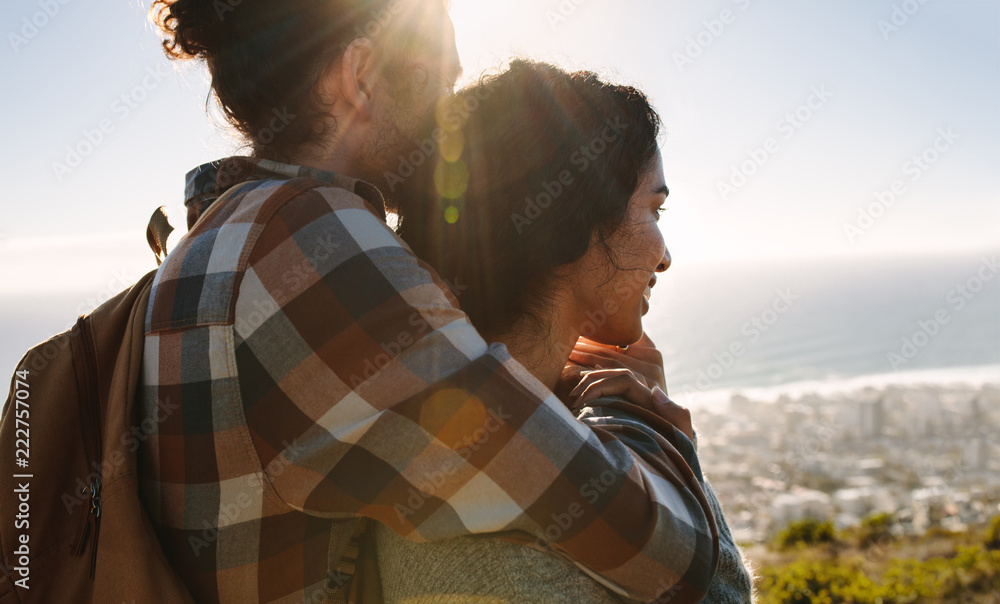 © Jacob Lund - Affectionate young couple admiring the view © Jacob Lund - Affectionate young couple admiring the view