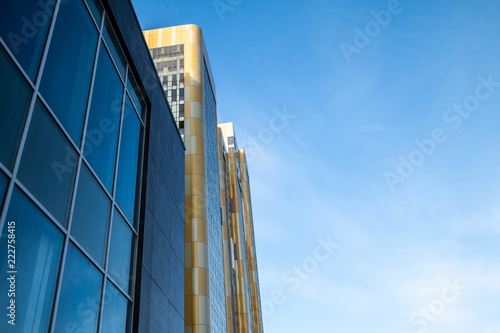 yellow and blue skyscrapper facade background