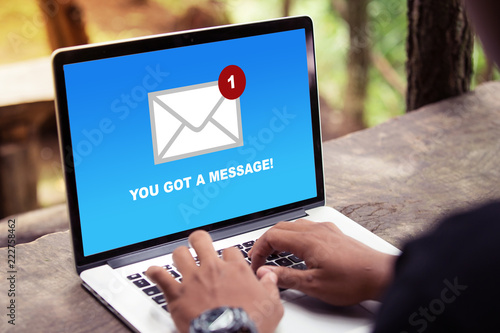 You've got a mail message on laptop screen concept photo