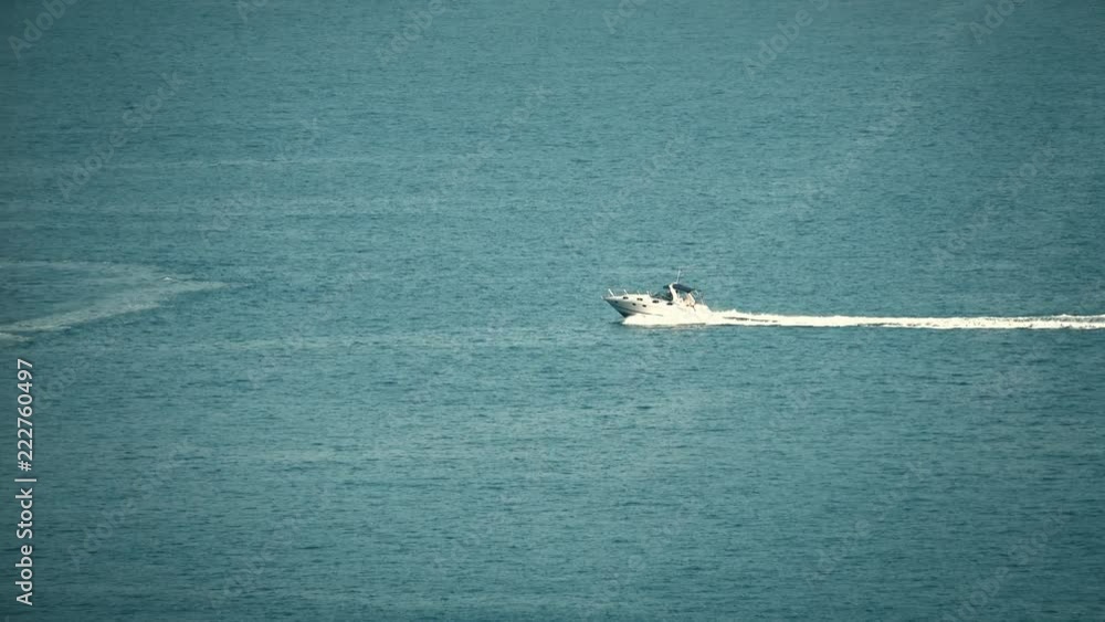 High speed motorboat moves at sea High speed motorboat moves at sea