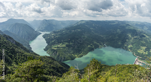 View from Banjska Stena on Drina river, Perucac lake, mountains, dam and border with Bosnia and Herzegovina photo