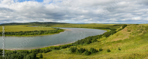 Panorama of the Northern river in the tundra. © sergunt